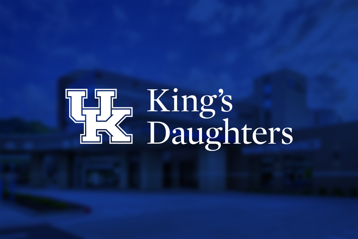 UKKD Logo on blue background with blurred image