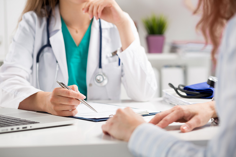 Female-physician-consult-hands.jpeg