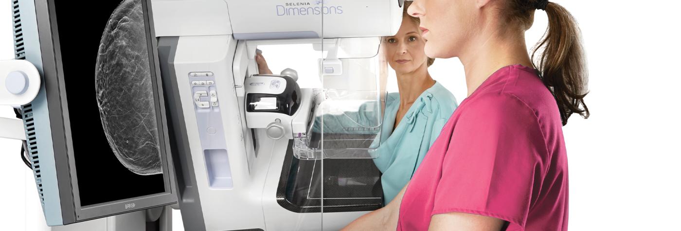 Patient undergoes a 3D mammography screening.