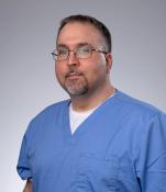 Man wearing scrubs